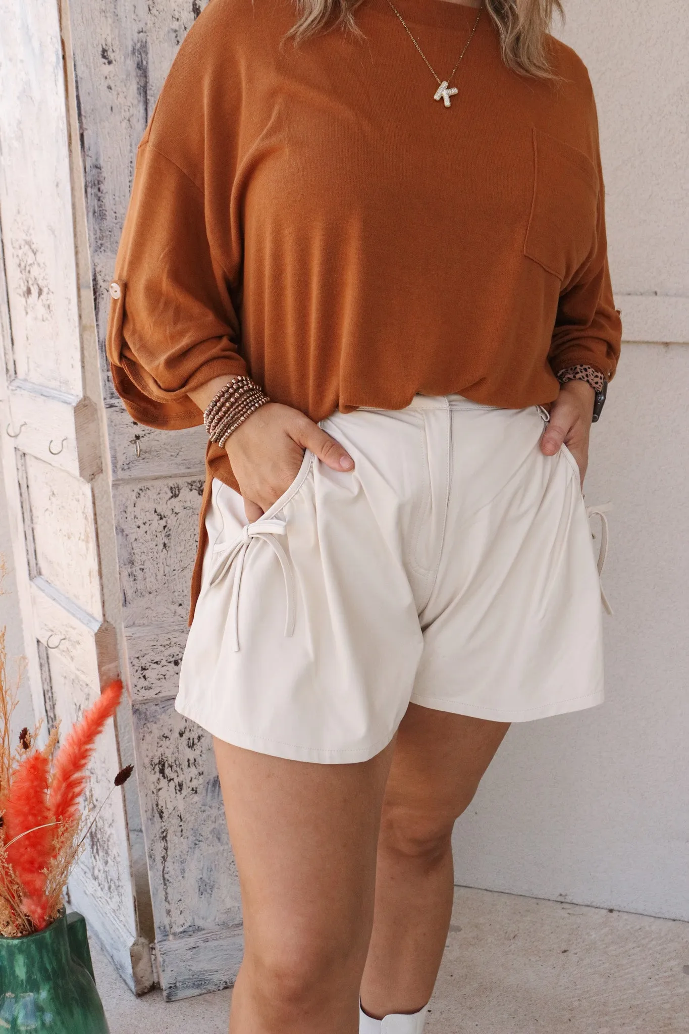 Full Schedule Cream Bow Leather Shorts